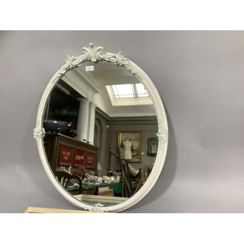 268 - An oval white framed wall mirror with leaf cresting together with a vintage colour print of Robin Ho... 