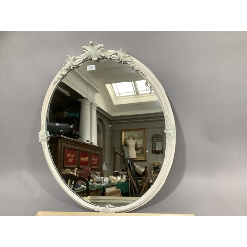 268 - An oval white framed wall mirror with leaf cresting together with a vintage colour print of Robin Ho... 