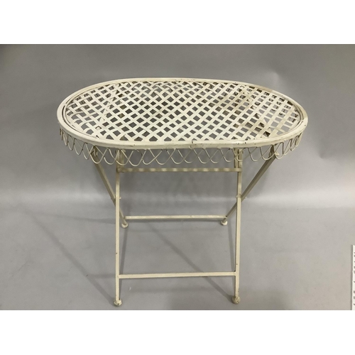 281 - A cream metal folding table with lattice surface and wire work apron