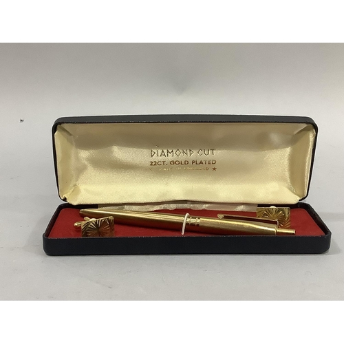 392 - A vintage twenty two carat gold plated pen and pair of cufflinks in original case.