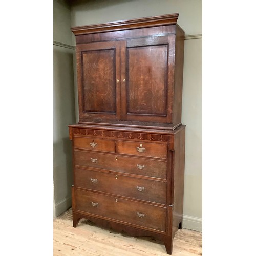 418 - A 19th century oak and mahogany banded two door cupboard with moulded cornice, internal shelves toge... 