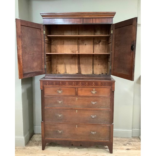 418 - A 19th century oak and mahogany banded two door cupboard with moulded cornice, internal shelves toge... 