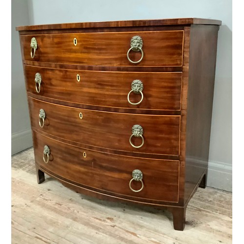 443 - A early 19th century mahogany bow front chest of drawers with boxwood stringing, four graduated draw... 