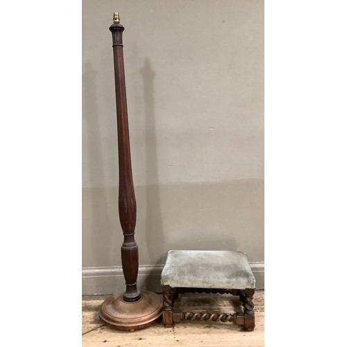 413 - An early 20th century mahogany standard lamp carved with leaf collars and on a circular base togethe... 