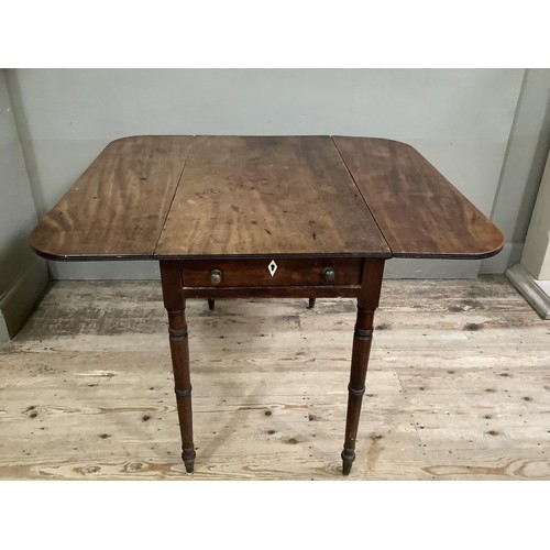 415 - A 19th century mahogany Pembroke table having rectangular drop leaves with rounded corners, drawer t... 