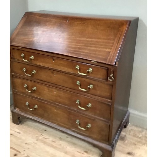 416 - A mahogany bureau in the Georgian style having a fall front with interior fitted with small drawers ... 