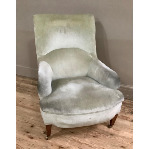 423 - An Edwardian mahogany armchair upholstered in pale green velvet, on square tapered legs and with bra... 