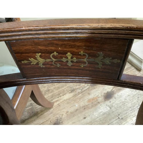 429 - A mahogany extending twin pedestal dining table together with a set of six Regency style dining chai... 