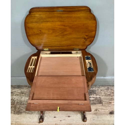 458 - An inlaid Victorian walnut work table with leather writing inset, two inkwells, stationary well with... 