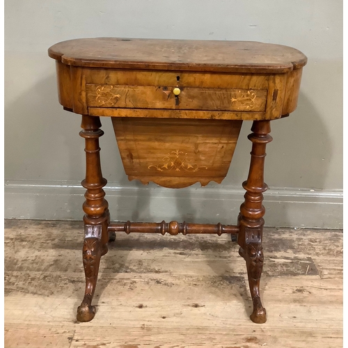 458 - An inlaid Victorian walnut work table with leather writing inset, two inkwells, stationary well with... 