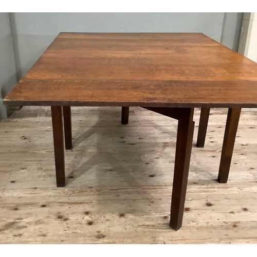 449 - An oak Pembroke dining table having rectangular drop leaves on square framing, 112cm wide