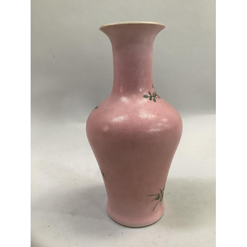 5B - A Chinese famille rose vase decorated with flowering peonies and birds on a graffito pink ground