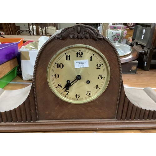 106 - Approximately twenty clock cases in wood, grey slate and spelter, some with associated movements