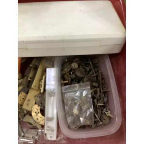 109 - A large quantity of re-purposed 19th and 20th century clock parts including weights, key, case parts... 