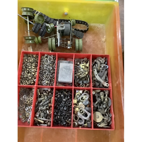 109 - A large quantity of re-purposed 19th and 20th century clock parts including weights, key, case parts... 