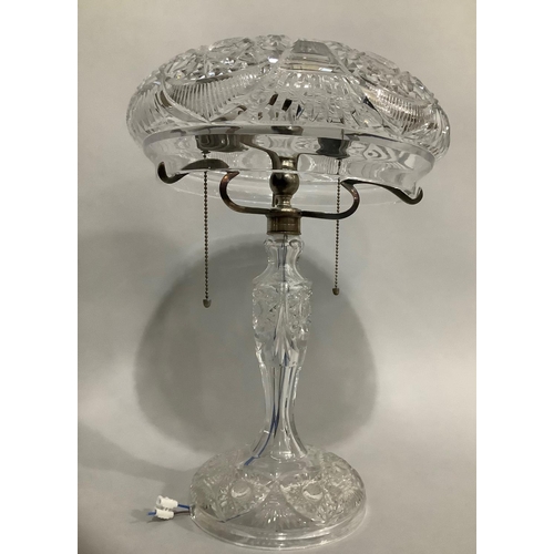 11 - A cut glass table lamp, metal mounted with mushroom shade, 45cm high