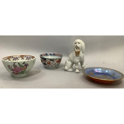 16 - An 18th century Chinese polychrome tea bowl, another English ridged tea bowl with sprays of pink flo... 