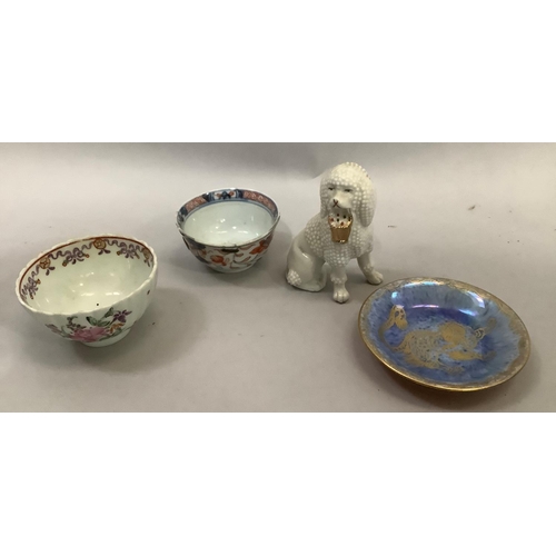 16 - An 18th century Chinese polychrome tea bowl, another English ridged tea bowl with sprays of pink flo... 