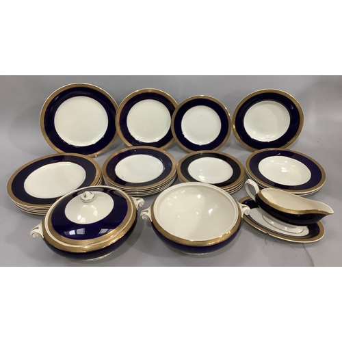 17 - A collection of cobalt blue and gilt Grafton china dinner ware comprising six plates, six medium pla... 