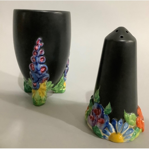 8 - A Clarice Cliff Bizarre 'My Garden' vase on black ground the feet modelled as foxgloves 15cm high, t... 