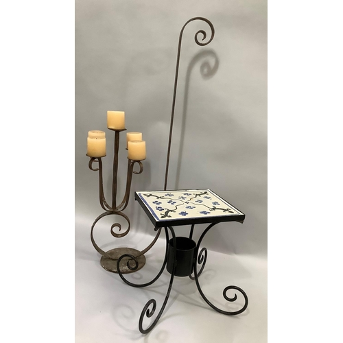 82 - A Menorcan hand painted tile and wrought iron garden occasional table, the top  31cm x 27cm, on four... 