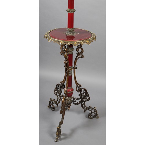 115 - A LATE 19TH CENTURY CAST GILT METAL AND MAROON POTTERY STANDARD LAMP with circular tier and telescop... 