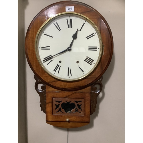 127 - A Victorian walnut drop down clock by Newhaven Clock Company Anglo-American clocks, having a cream d... 