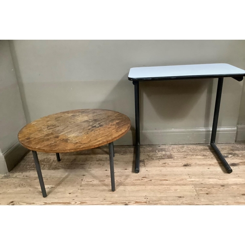 111 - A 1970's circular mahogany coffee table together with a white formica projector table