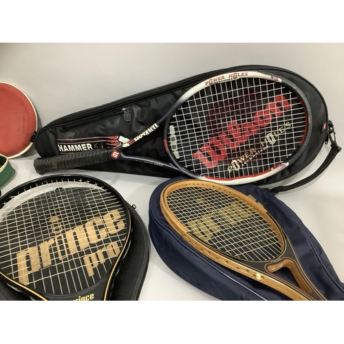 198 - A Prince Pro tennis racquet with cover, a Prince Extender graphite tennis racquet and cover, another... 