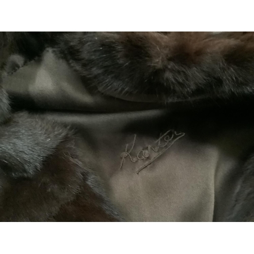 277 - A blonde mink half length coat with silk lining and another sleek dark brown half length fur by 'Kar... 