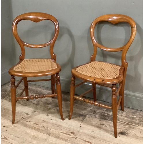 408 - A pair of Victorian polished beech and begere caned balloon back bedroom chairs