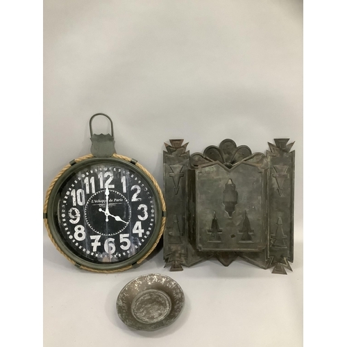 192 - A metal panel wall mounted tea light holder together with a garden/conservatory clock with hanging l... 