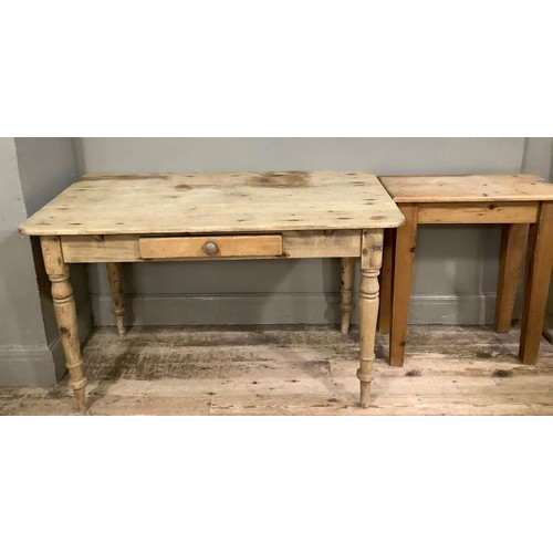 87 - A Victorian pine kitchen side table with drawer on turned legs, 126cm wide together with a pine side... 