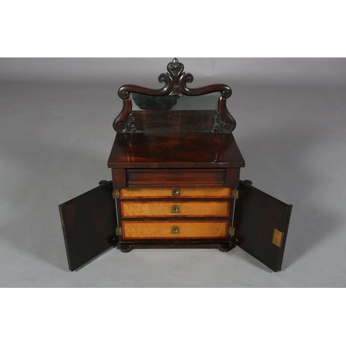 50 - A lady's Victorian miniature mahogany chiffonier-dressing box with raised mirror back, above a friez... 