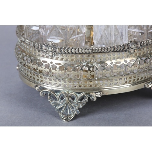 8 - A VICTORIAN SILVER PLATED SIX BOTTLE BREAKFAST CRUET, the oval basket of pierced design with gadroon... 