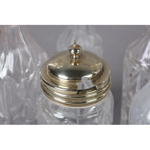 8 - A VICTORIAN SILVER PLATED SIX BOTTLE BREAKFAST CRUET, the oval basket of pierced design with gadroon... 