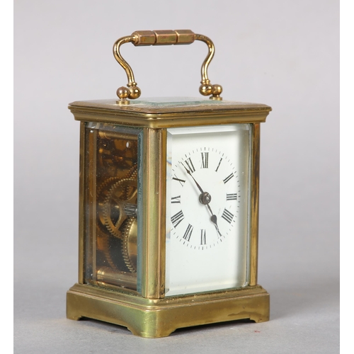 25 - A late 19th century French carriage clock time piece, with 8-day cylinder movement in a brass and fi... 