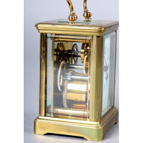25 - A late 19th century French carriage clock time piece, with 8-day cylinder movement in a brass and fi... 