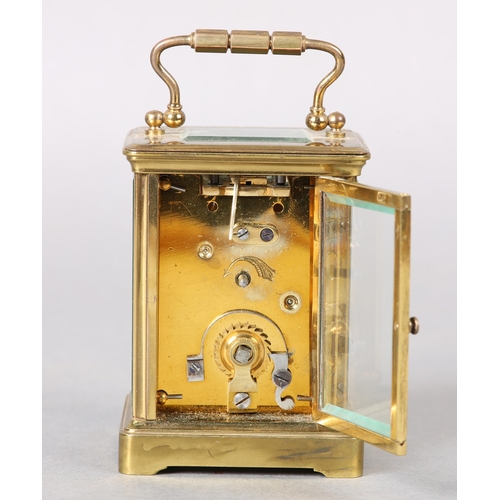 25 - A late 19th century French carriage clock time piece, with 8-day cylinder movement in a brass and fi... 