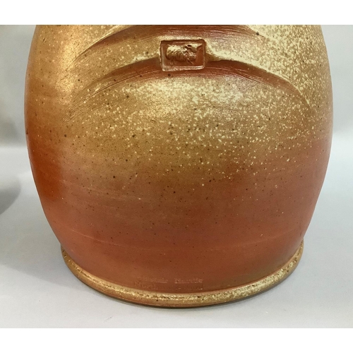 24 - A large ash fired stoneware jug by Alastair Hardie (b.1941) having a green ash internal glaze, impre... 