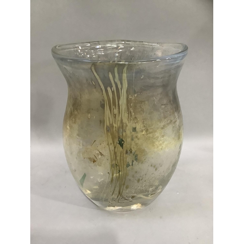 13 - A studio glass vase with lustre thread and fragment inclusions over a gold ground, having a flared r... 