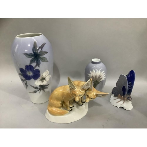 18 - A Porcelain de Paris figure group of two Fennec foxes on a naturalistic base, two Royal Copenhagen v... 