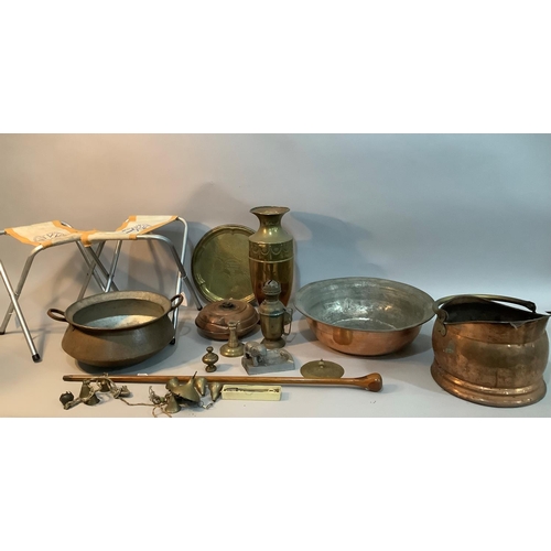 108 - A twin handled copper pan, a copper and brass coal scuttle, a wide rimmed copper bowl etched to the ... 
