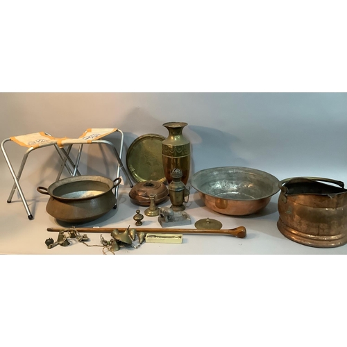 108 - A twin handled copper pan, a copper and brass coal scuttle, a wide rimmed copper bowl etched to the ... 