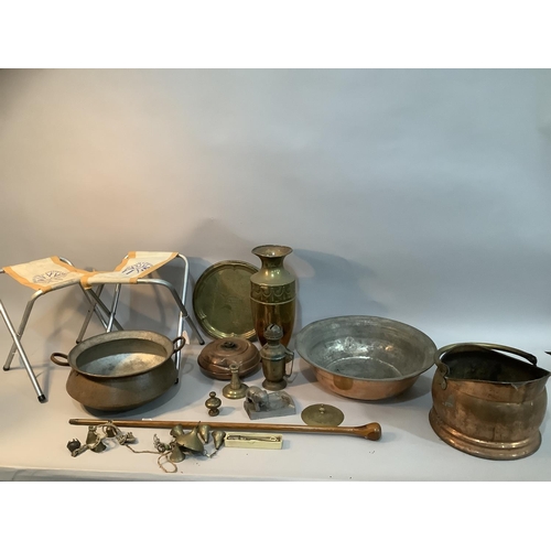 108 - A twin handled copper pan, a copper and brass coal scuttle, a wide rimmed copper bowl etched to the ... 