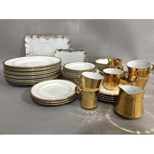 180 - A quantity of gilt tableware including Royal Doulton Royal Gold, Crown Staffordshire, two Limoges mo... 