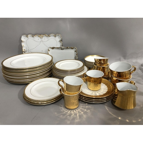 180 - A quantity of gilt tableware including Royal Doulton Royal Gold, Crown Staffordshire, two Limoges mo... 