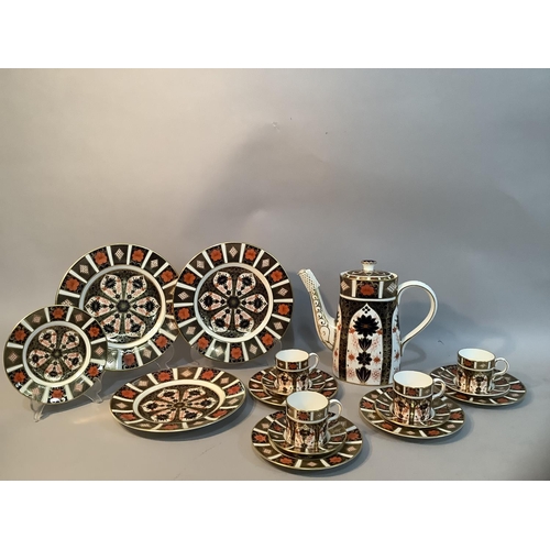 30 - A Royal Crown Derby Old Imari pattern no.1128 coffee service comprising a coffee pot, four coffee ca... 