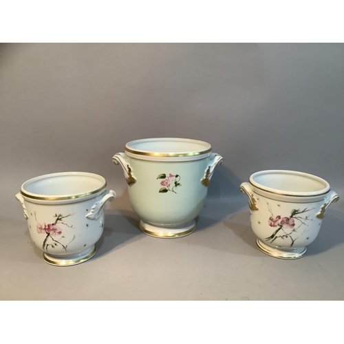 170 - A pair of Vista Allegra cache pots with painted floral decoration and another larger example