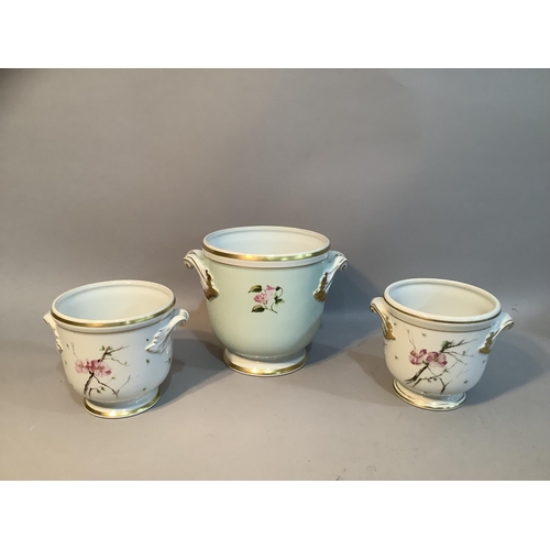 170 - A pair of Vista Allegra cache pots with painted floral decoration and another larger example
